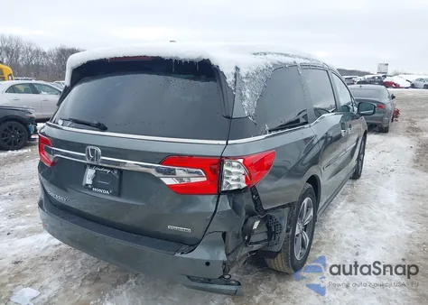 2018 Honda Odyssey Touring z USA, uszkodzony, nr VIN 5FNRL6H85JB017522